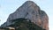 Flock of flying seagulls near Parque natural del Penon de Ifach in Calpe, symbol of Calpe town, 4k footage. Province of Alicante,