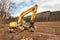 Flood adjustments river. Work on the riverbed. Excavator on the work to strengthen the shoreline of the river.