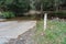 A flood pole , ford crossing at a river in australia nsw