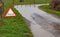 A flood warning road sign.