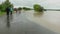 Flood water of a hurricane flooding the countryside. Hit area with storm surges