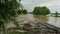 Flood water of a hurricane flooding the countryside. Hit area with storm surges