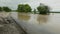 Flood water of a hurricane flooding the countryside. Hit area with storm surges