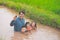 Flood water in rice field and pond, Farmer family working in nature water pond  of rice paddy field