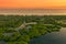 Flooded amazonian rainforest in Negro River at sunset time, Amazonas, Brazil.