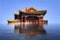 Flooded ancient chinese temple. Climate change global warming concept.