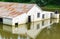 Flooded farm building