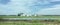 Flooded farmland and destroyed grain bins in Iowa along interstate 29