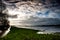 Flooded fenland and stormy sky