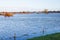 Flooded floodplains of the Dutch river IJssel and the churchtowers of Zutphen