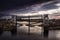 Flooded gate with dramatic skies