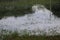 Flooded landscape in a football field, an announcement on the lawn in the rainy season