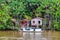 Flooded local huts on the Amazon River, Brazil