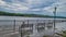 Flooded Mississippi River Fence and benches on St. Feriole Island