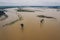 Flooded plain countryside landscape and river from drone pov