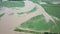 Flooded road heavy rain flooding taken during drone flight overflowing river