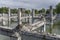 Flooded ruins of collapsed concrete building with large flock of Black-billed gulls, Christchurch, New Zealand