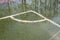 A flooded soccer field after heavy rain