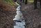 Flooded stream to a narrow riverbed where the water drains quickly, the bends must be laid out with a stone so that water erosion