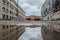 Flooded territory of abandoned industrial area, water reflection