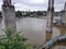 Flooding river almost swallos small bridge in pune