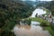 Flooding, water across river plains, farmland, and village, aerial view