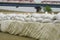 Floods. sandbags that form a parapet against water. flood protection wall.