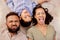 Floor, family and fun on a carpet in living room with cheerful, silly and playful people showing different face