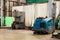 Floor sweeper and washer scrubber drier car in an industrial building