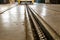 The floor on which the transport mechanism in the form of a chain is the metal surface of the floor