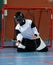 Floorball goalie defending the net at an important championship game