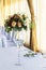 Floral arrangement for decoration wedding table for guests. Room