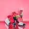 Floral Arrangement for Valentine`s Day with a Decorative Purse and a Shoe