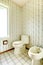 Floral bathroom with toilet and bidet