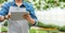 Floral business. African american woman in apron working with digital tablet