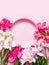 Floral circle frame banner in pastel pink color. Space for text. Place for text. Pink and white flowers flatlay. Greeting card for