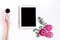 Floral concept with pink flowers on white background top view mock-up