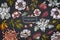 Floral design on dark background with japanese chrysanthemum, blackberry lily, eucalyptus flower, anemone, iris japonica