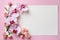 Floral elegance Orchids grace white paper, pastel pink backdrop for text