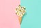 Floral flat lay Chamomile daisy flowers ice cream waffle cone