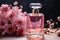 Floral fragrance Pink blooms and a matching pink perfume bottle