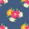 Floral pattern on a blue background with polka dots