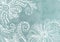 Floral pattern on a light, delicate, turquoise background.