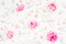 Floral pattern of pink roses, wild flowers and petals on white background. Valentines day. Flat lay, Top view.