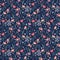 Floral pattern. Pretty flowers on dark blue background. Printing with small colorful flowers. Ditsy print. Seamless