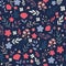 Floral pattern. Pretty flowers on dark blue background. Printing with small colorful flowers. Ditsy print. Seamless