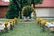 Floral rustic arch for wedding ceremony with sunflowers