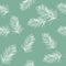 Floral seamless pattern, green and white split-leaf. Tropical plant with vines on green background
