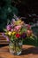 Floral summer bouquet, bunch of flowers, colorful flowers, dahlias, roses, tickseed, snapdragon flowering in one arrangement.