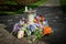 Floral tributes around a monument left after the death of a family member